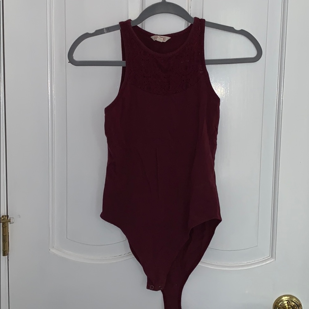 Maroon sleeveless body suit